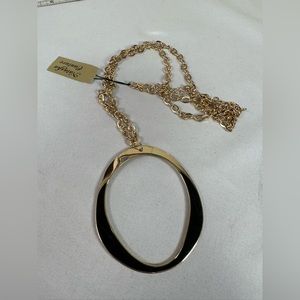 Long modernist goldtone statement necklace